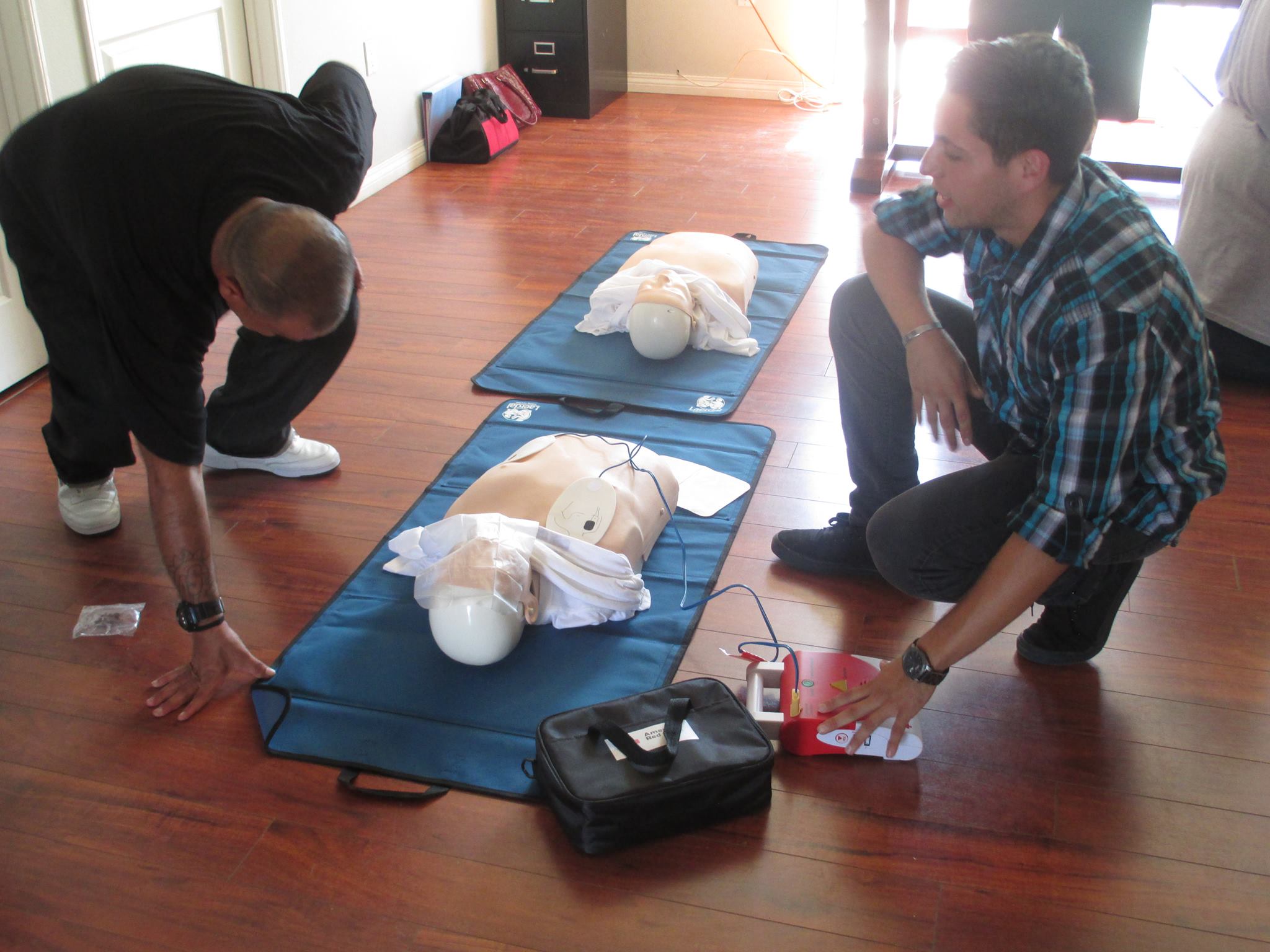 Practicing CPR on a mannequin